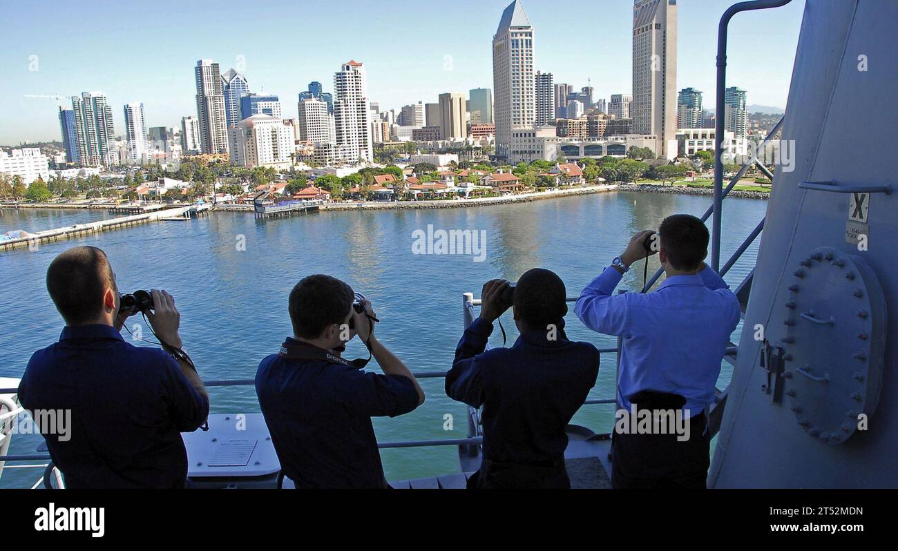 0810074774B-070 SAN DIEGO (Oct. 7, 2008) Sailors observe downtown San Diego while aboard the amphibious assault ship USS Boxer (LHD 4). Boxer is on a training exercise preparing for a Western Pacific deployment scheduled for early next year. Navy Stock Photo