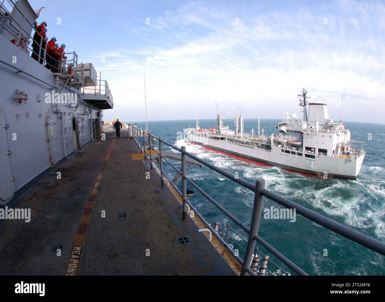 0701104007G-006 Persian Gulf (Jan. 10, 2007) - The amphibious assault ship USS Boxer (LHD 4) comes alongside British Royal Fleet Auxiliary (RFA) support tanker RFA Bayleaf (A109) for an underway replenishment (UNREP). Boxer is the flagship for Boxer Expeditionary Strike Group currently operating in the Persian Gulf conducting Maritime Security Operations (MSO) in support of U.S. 5th Fleet. U.S. Navy Stock Photo