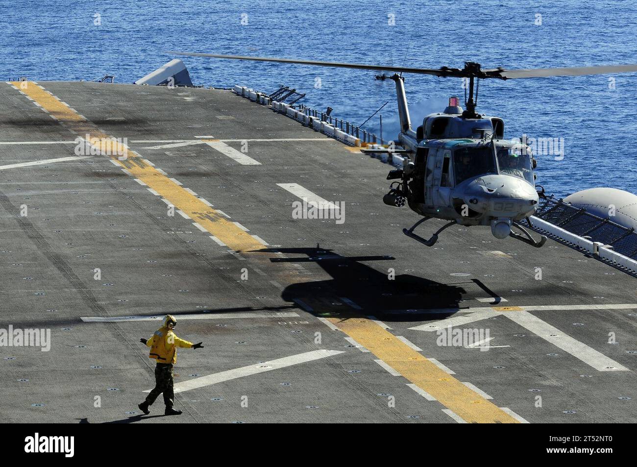 amphibious assault ship, composite unit training exercise, COMPTUEX, evil eyes, flight deck, hand signals, HMM-163, LHD 4, Marine Medium Helicopter Squadron-163, navy, Southern California, U.S. Navy, uh-1n huey, USS Boxer Stock Photo