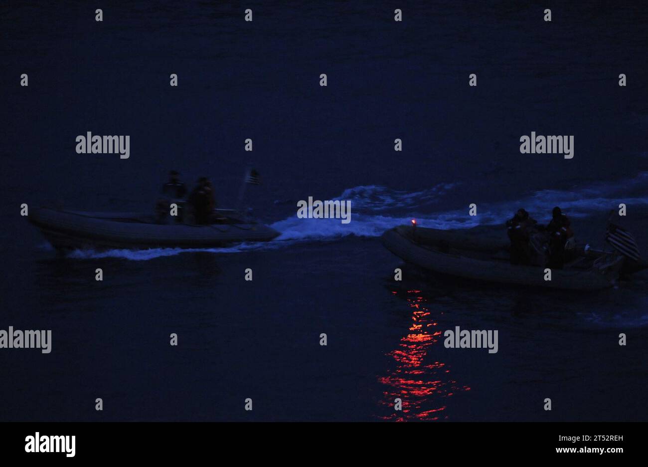 1003187280V-329  BUSAN, Republic of Korea (March 18, 2010) Sailors assigned to the U.S. 7th Fleet command ship USS Blue Ridge (LCC 19) conduct nighttime small-boat attack force protection drills in the harbor of Busan, Republic of Korea. Navy Stock Photo