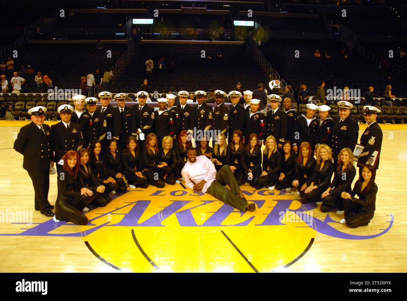 0612106536T-107 Los Angeles, Calif. (Dec. 10, 2006) - Crew members from the fast attack submarine USS Los Angeles (SSN 688) pose for a photo with the Los Angeles Lakers Cheerleaders and former NBA player and Annapolis Naval Academy graduate David Robinson after the Lakers won against the San Antonio Spurs.   The Los Angeles is currently participating in a namesake city visit. This is the first port call the Los Angeles, based out of Pearl Harbor, Hawaii, has made to the city it was named after. U.S. Navy Stock Photo