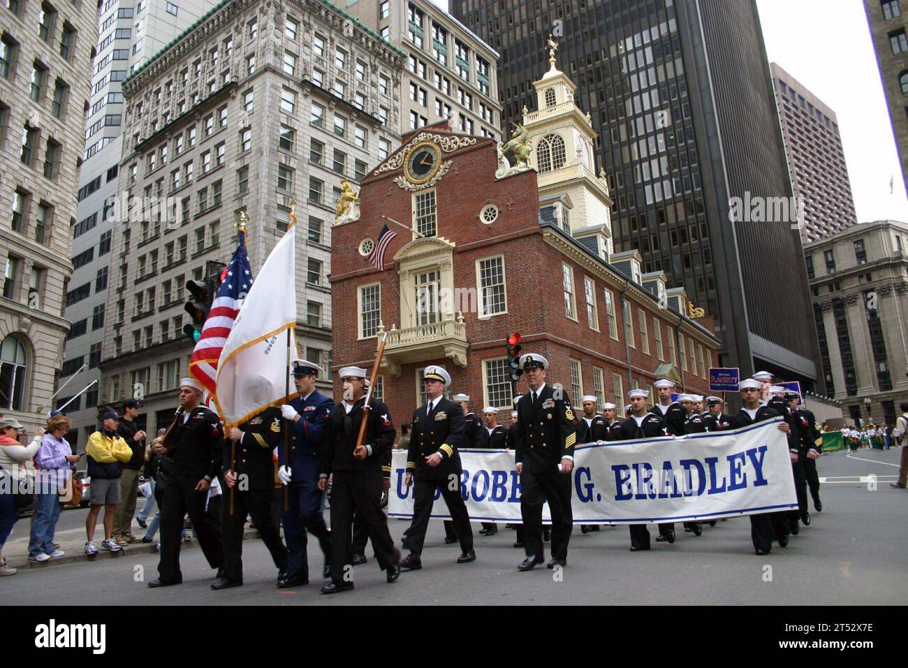 0710078110K-003  BOSTON, Mass. (Oct. 7, 2007) Р Crew members of the guided-missile frigate USS Bradley (FFG 49) pass the Old State House in downtown Boston during the annual Columbus Day Parade. The Bradley is in Boston for a four-day port visit. The parade was just one of several planned events for the Sailors during their holiday visit including a community service project at the New England Shelter for Homeless Veterans and the presentation of colors at the New England Patriots game. U.S. Navy Stock Photo