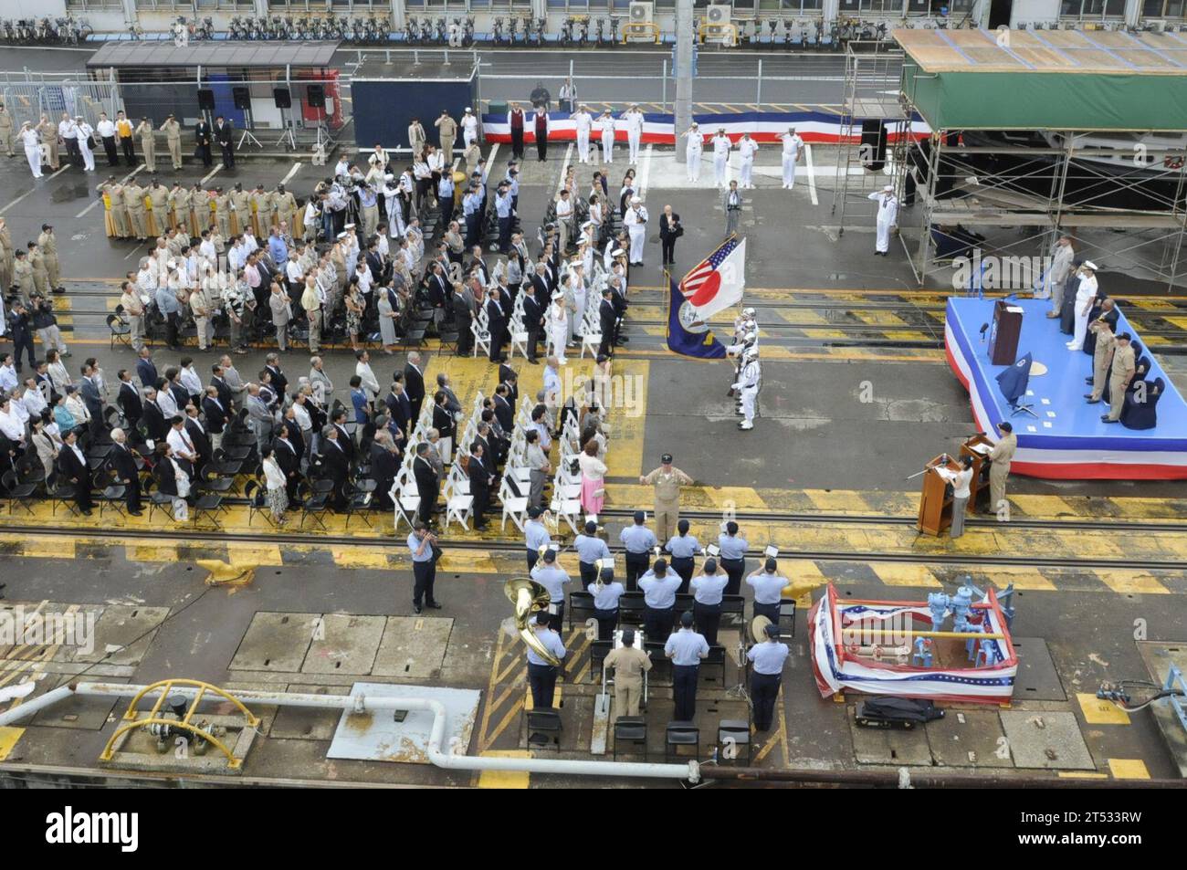 0907177478G-041 YOKOSUKA, Japan (July 17, 2009) The color guard assigned to the amphibious command ship USS Blue Ridge (LCC 19) and the U.S. 7th Fleet parades the colors during the 30th anniversary of the July 17, 1979 arrival of Blue Ridge in Japan as part of the U.S. Navy Forward Deployed Naval Force. Stock Photo