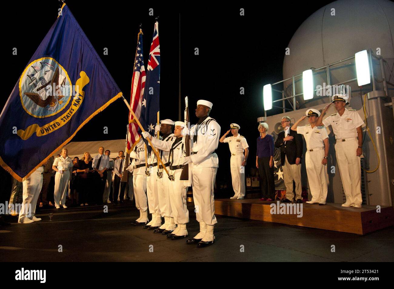 110727CZ945-359 CAIRNS, Australia (July 27, 2011) The color guard assigned to the U.S. 7th Fleet command ship USS Blue Ridge (LCC 19) parades the colors at a Big Top reception on the shipХs flight deck in celebration of Talisman Sabre 2011. Talisman Sabre is a bilateral exercise intended to train Australian and U.S. Forces in planning and conducting Combined Task Force operations in order to improve U.S. and Australian combat readiness and interoperability. Stock Photo