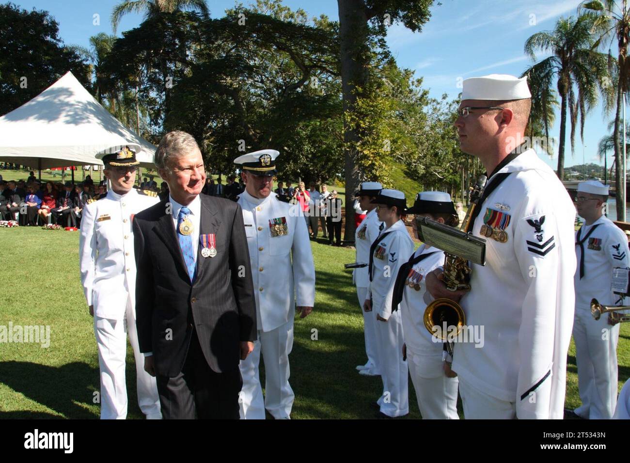 1105071X994-001 BRISBANE, Australia (May 7, 2011) Members of the U.S. 7th Fleet Band are inspected by acting Governor and Chief Justice of Queensland the Honorable Paul de Jersey, AC, in a Coral Sea Memorial Service at Newstead Park. The band is in Australia to commemorate the 69th anniversary of the Battle of the Coral Sea and to share music with the community in the wake of the recent floods. (U.S. Navy Stock Photo