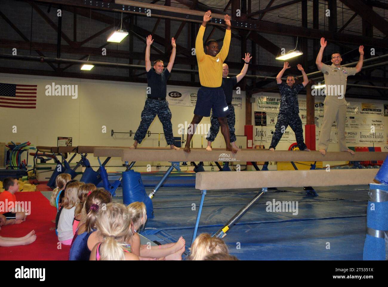 balance beam, Fargo Navy Week, kids, Sailors, tip the ship exercise Stock Photo