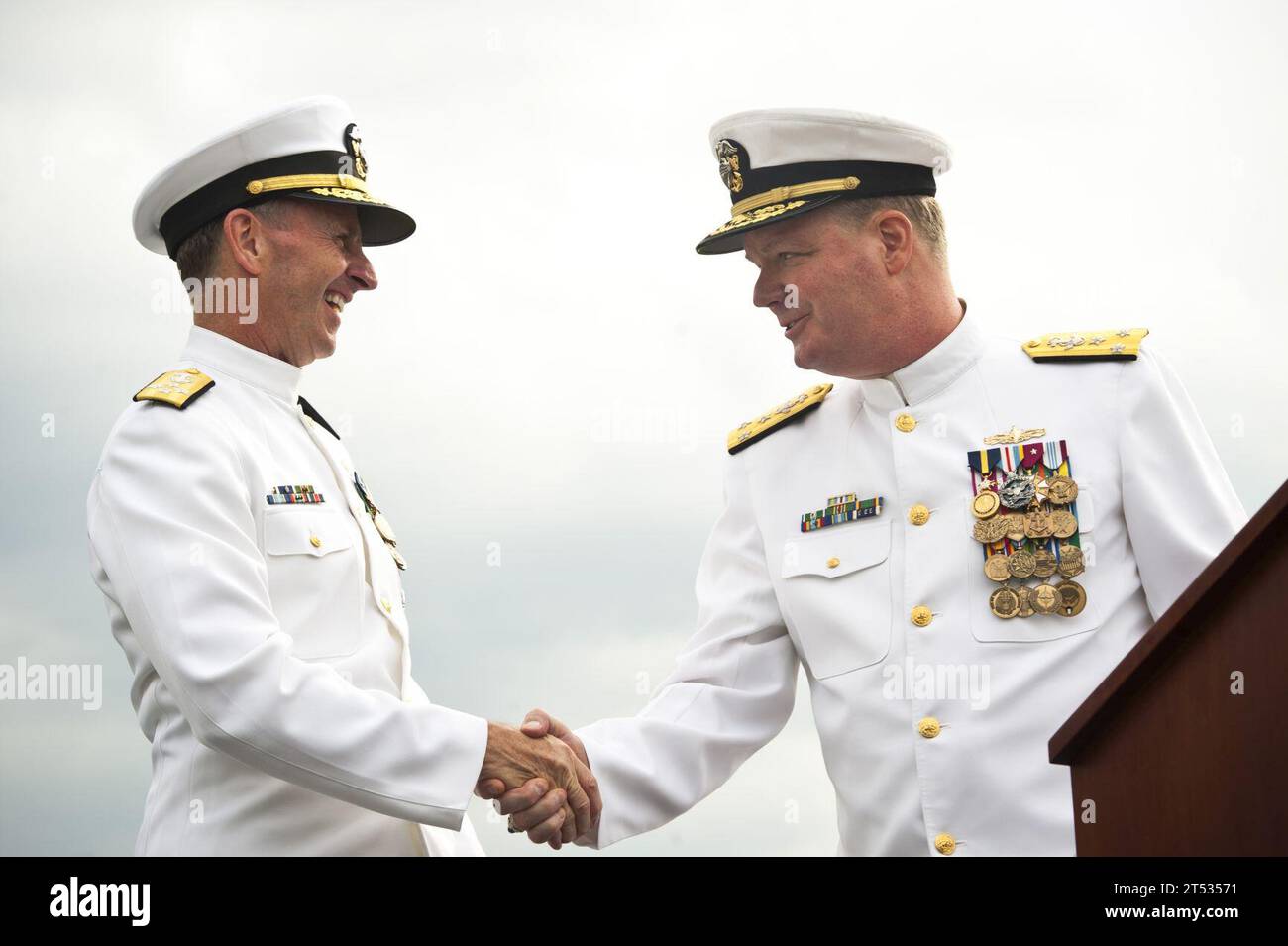 110930KK576-074 BALTIMORE (Sept. 30, 2011) Chief of Naval Operations (CNO) Adm. Jonathan W. Greenert, left, congratulates Vice Adm. Barry McCullough during a change of command ceremony at Fort McHenry National Monument. Vice Adm. Michael S. Rogers relieved McCullough as commander of U.S. Fleet Cyber Command and U.S. 10th Fleet. Fleet Cyber Command is the Navy's central operating authority for networks, cryptologic and signals intelligence, information operations, cyber, electronic warfare, and space capabilities. Stock Photo