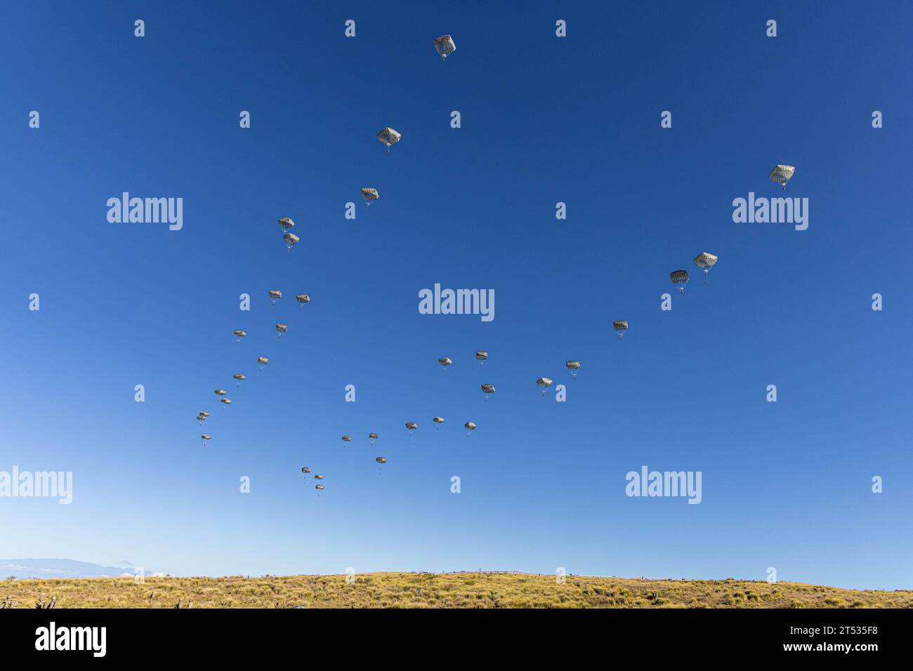 Pohakuloa Training Area, Hawaii, USA. 31st Oct, 2023. U.S. Army Soldiers assigned to 2nd Infantry Brigade Combat Team (Airborne), 11th Airborne Division, jump from the C-17 at Pohakuloa Training Area, Hawaii, Oct. 31, 2023. The Joint Pacific Multinational Readiness Center (JPMRC) is the Armys newest Combat Training Center (CTC) and generates readiness in the environments and conditions where our forces are most likely to operate in. JPMRC 24-01 includes over 5,300 training participants from across the U.S. Joint Force, New Zealand, the United Kingdom, Indonesia, and Thailand. (Credit Image Stock Photo