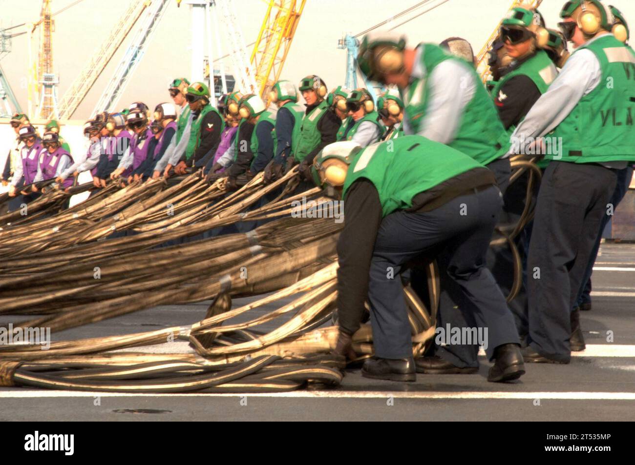 0611290455L-011 Portsmouth, Va. (Nov. 29,2006) - Sailors assigned to the air department aboard the Nimitz-class aircraft carrier USS Harry S. Truman (CVN 75) raise the aircraft barricade during flight deck training drills held during a scheduled fast cruise in preparation for upcoming sea trials.  Truman is conducting a docked planned incremental availability (PIA) at Norfolk Naval Shipyard, Portsmouth, Va., and will return to sea this fall. U.S. Navy Stock Photo