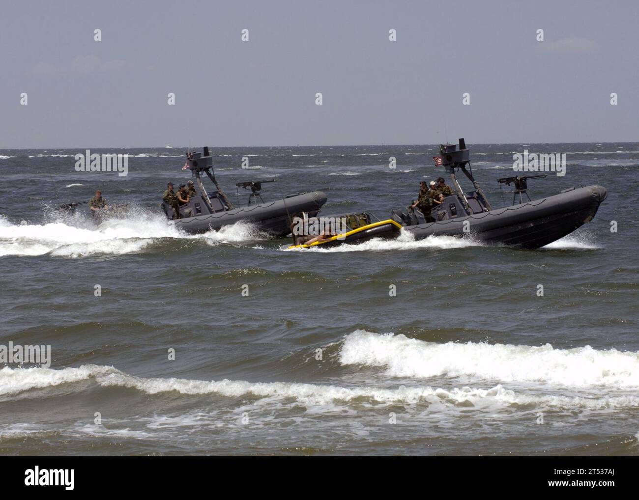 0907188949D-155 NORFOLK, Va. (July 18, 2009) Navy SEALs are extracted from the waters of the Chesapeake Bay into a sling boat being pulled by a rigid hull inflatable boat (RHIB) during a capabilities demonstration at Naval Amphibious Base Little Creek. The Naval Special Warfare community displayed its capabilities as part of the 40th UDT-SEAL East Coast Reunion celebration. Events are planned throughout the weekend to honor UDT/SEAL history, heritage, and families. (Official U.S. Navy Stock Photo
