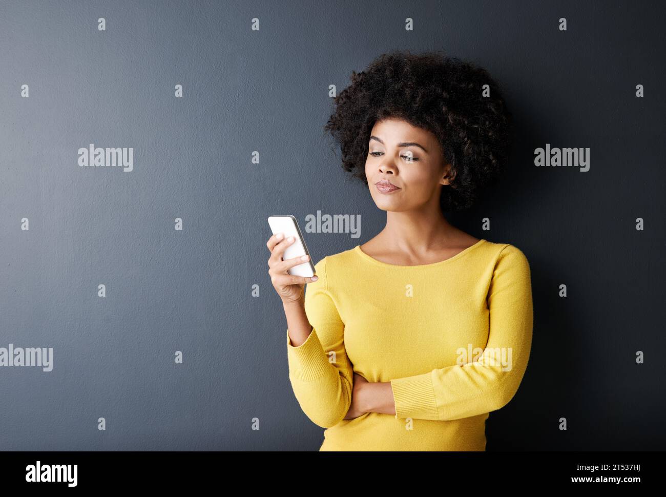 Black woman, thinking and reading phone with fake news, social media or post online on app or website. African, face and email communication, chat or Stock Photo