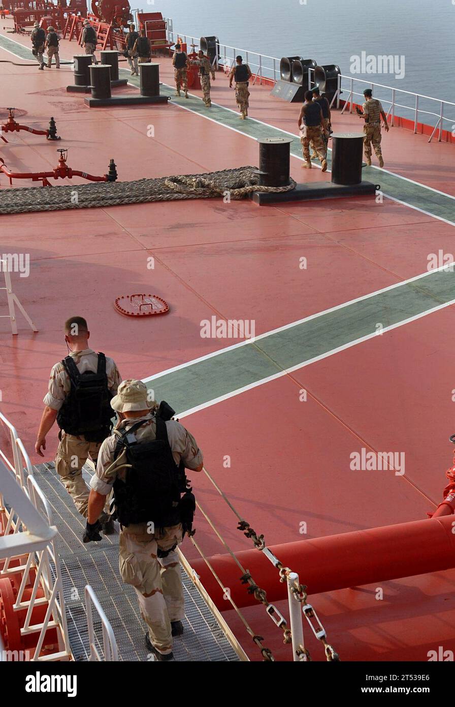 0706030684R-166  PERSIAN GULF (June 3, 2007) - Visit, board, search and seizure (VBSS) team members from guided-missile destroyer USS Preble (DDG 88), U.S. Coast Guard and Iraqi forces board an oil tanker in the Persian Gulf. Preble is conducting Interaction Patrols (IPATS), which are an element of maritime operations and are conducted in Iraqi territorial waters so that commercial shipping and fishing can occur safely in the region. Preble, as part of John C. Stennis Carrier Strike Group, is conducting maritime operations in the Persian Gulf. U.S. Navy Stock Photo