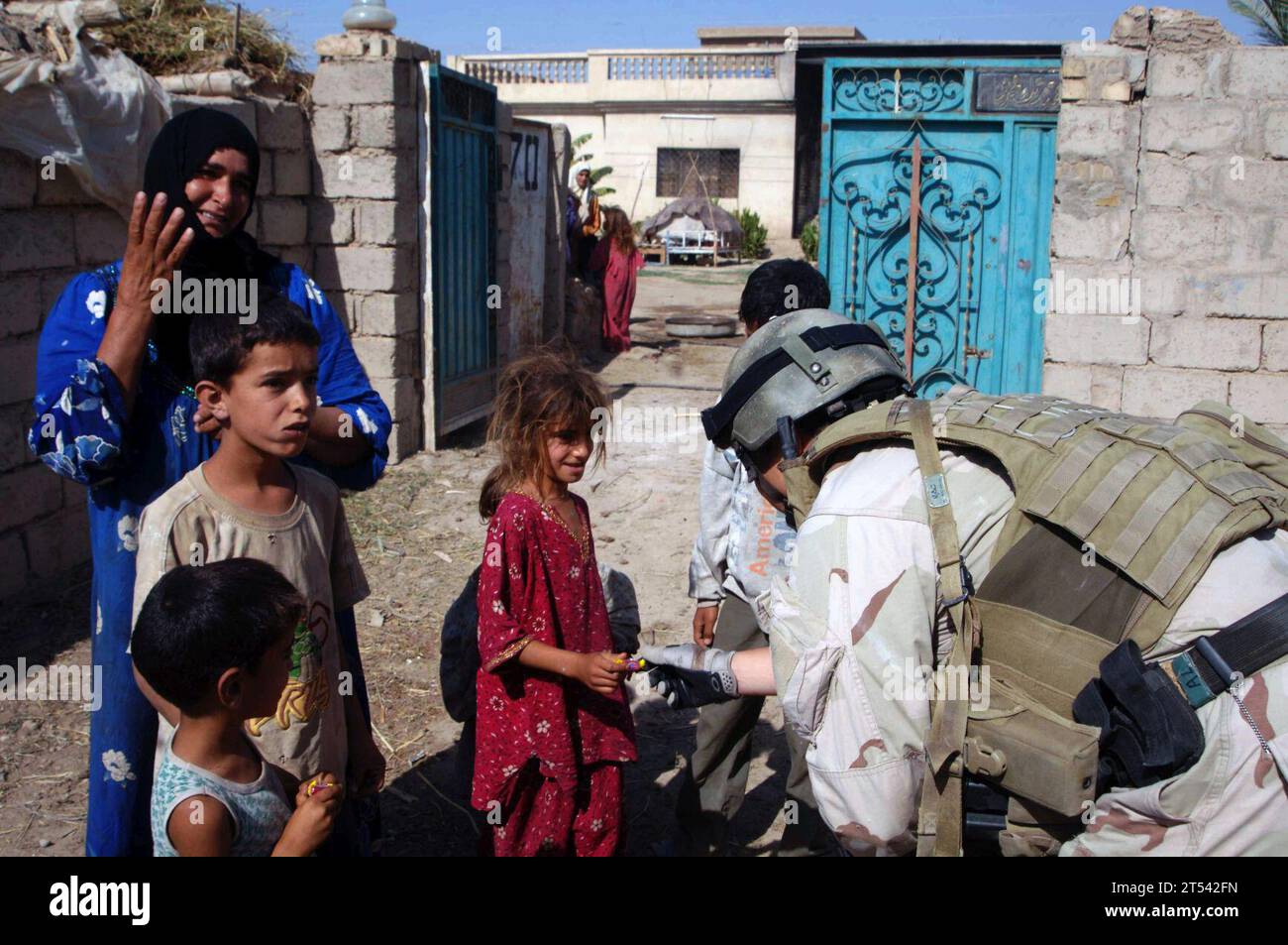 Coalition Forces, Iraq, Iraqi Army soldiers patrol, local school house ...