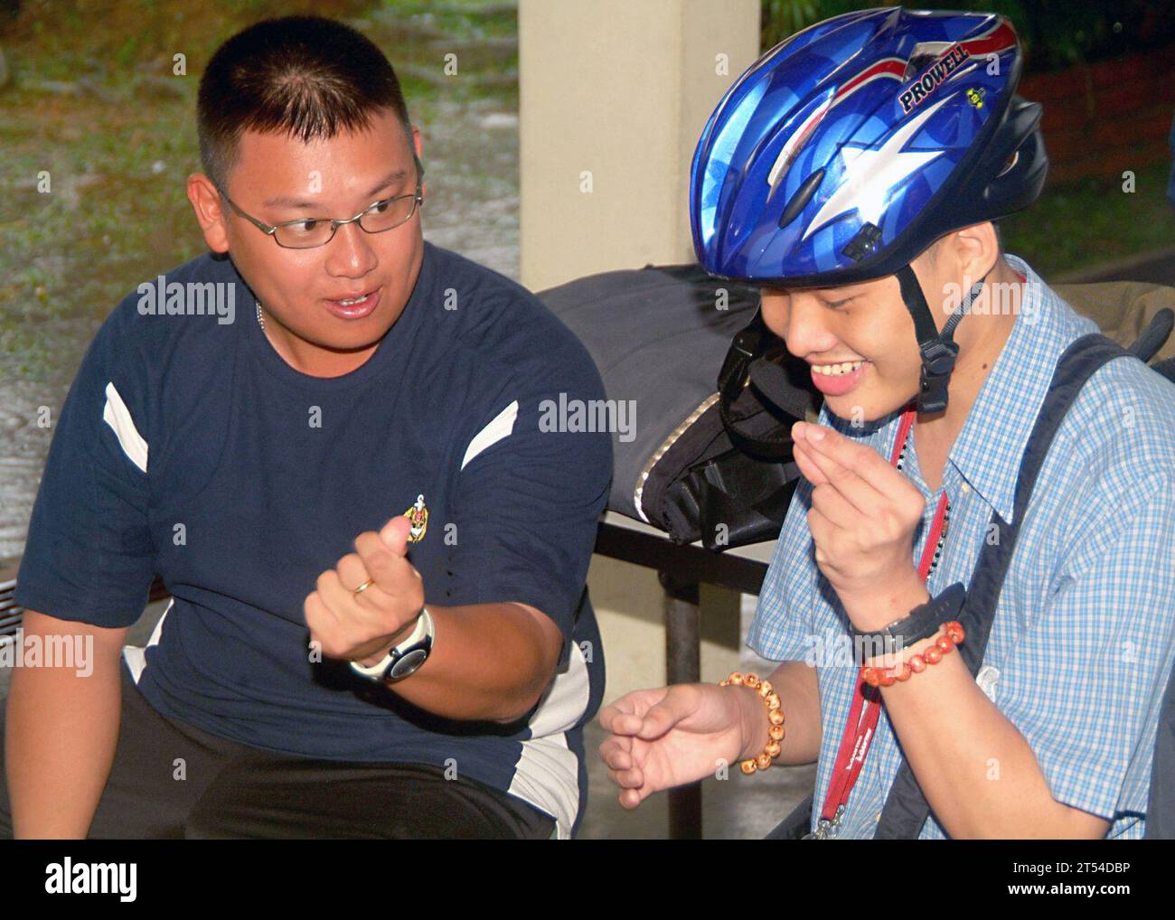 Cooperation Afloat Readiness and Training (CARAT) 2007, Movement for the Intellectually Disabled of Singapore (MINDS), Singapore, Singapore Navy sailor Communicators Stock Photo