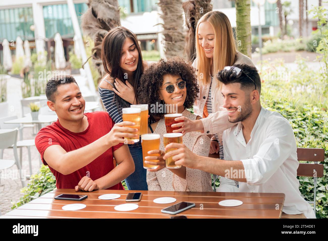 Men cheering in pub hi-res stock photography and images - Alamy