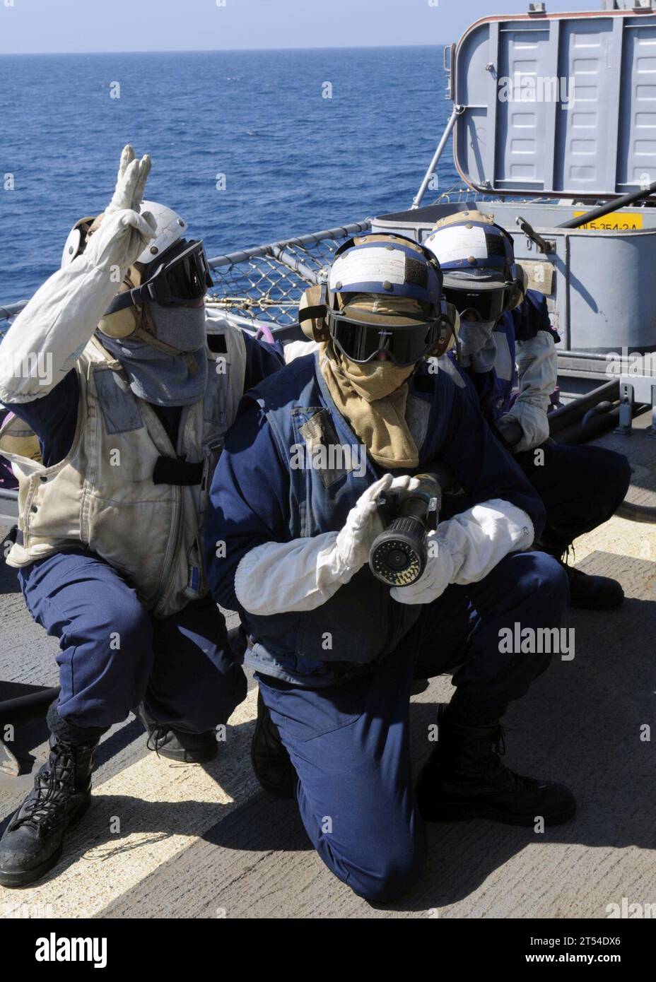 crash and salvage drill, hose team three, RHIB, Royal Australian Navy Adelaide-class guided-missile frigate HMAS Darwin (FFG 04), Talisman Saber 2011, Timor Sea, U.S. navy , USS Cowpens (CG 63) Stock Photo