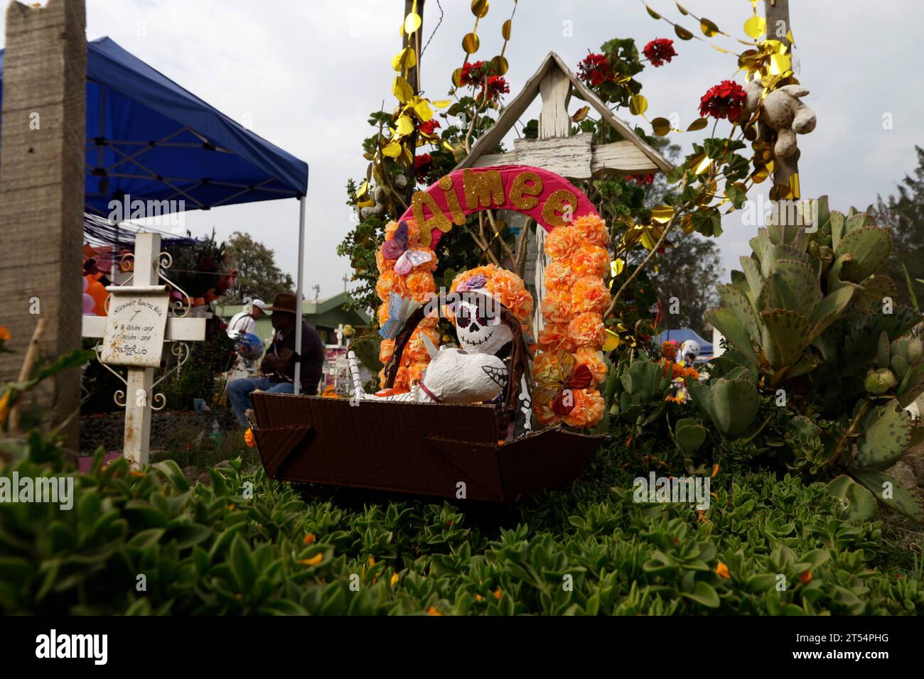 Mexico City, Mexico. 2nd Nov, 2023. The graves of children and adults are decorated with arrangements and gifts on the Day of the Dead holiday at the Pantheon of San Antonio Tecomitl in the Milpa Alta Mayor's Office in Mexico City. on November 2, 2023 in Mexico City, Mexico (Credit Image: © Luis Barron/eyepix via ZUMA Press Wire) EDITORIAL USAGE ONLY! Not for Commercial USAGE! Stock Photo