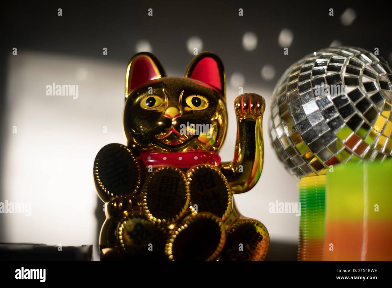 Cat Mascot. The Cat That Brings Good Luck. Toys on the shelf. A Symbol