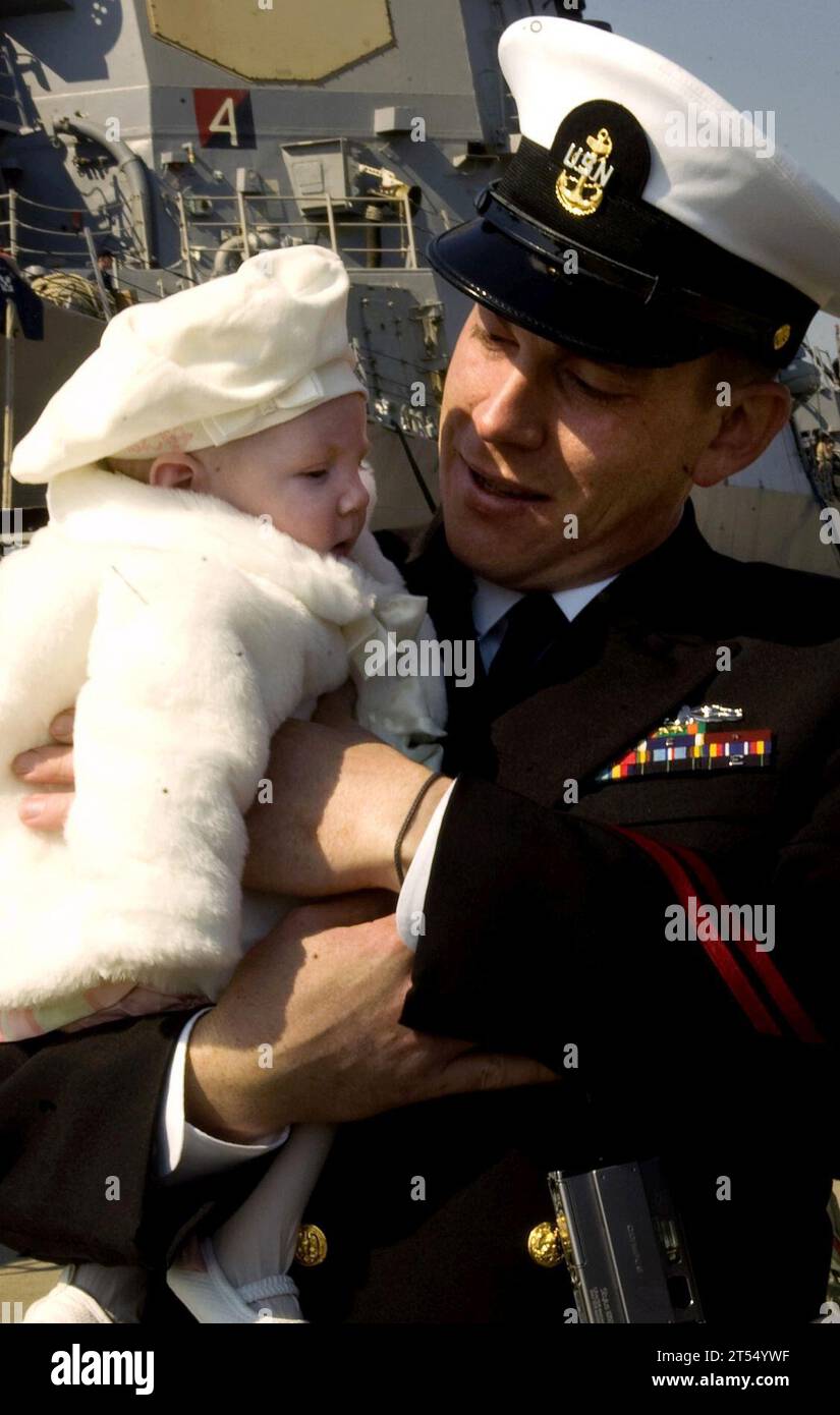 female baby, male sailor. Stock Photo