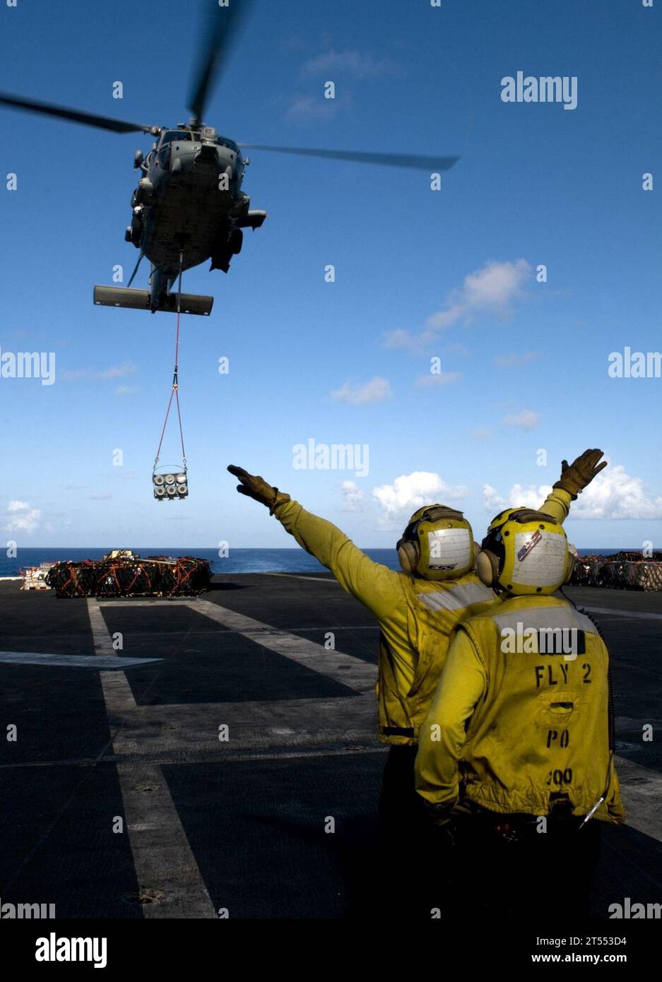 flight deck, hh-60H Sea Hawk helicopter, hs-15, landing signalmen ...