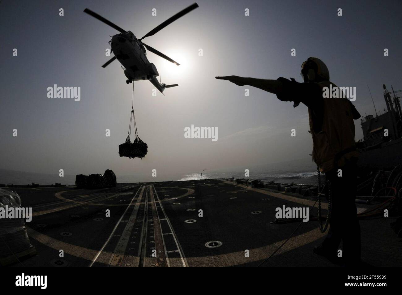 guided-missile cruiser USS Anzio (CG 68), Mars-Class combat stores ship USNS San Jose (T-AFS-7), SA-330 Puma helicopter, U.S. Navy Stock Photo