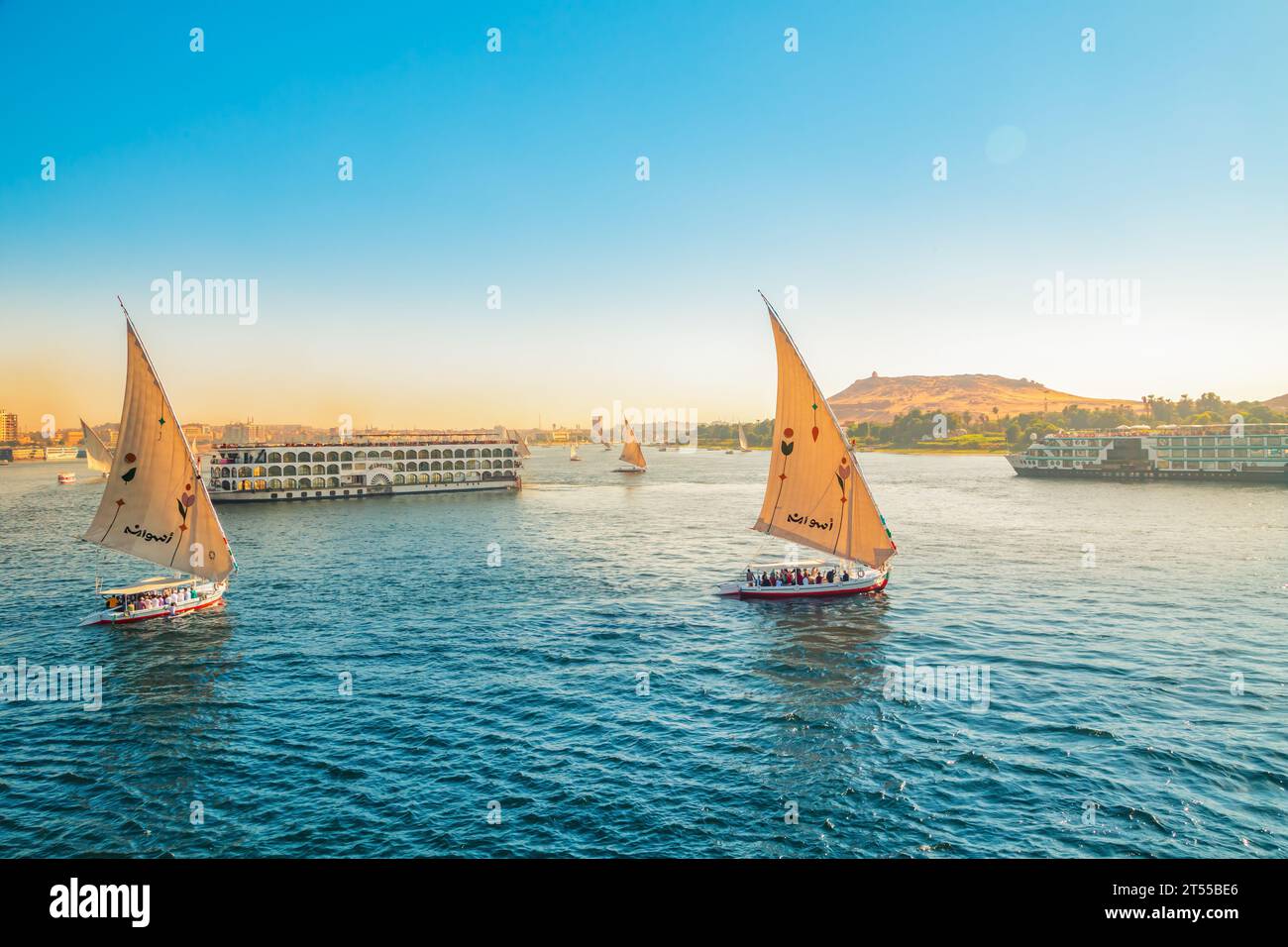 Traditional felucca boats on the Nile River in Aswan. Magnificent view ...
