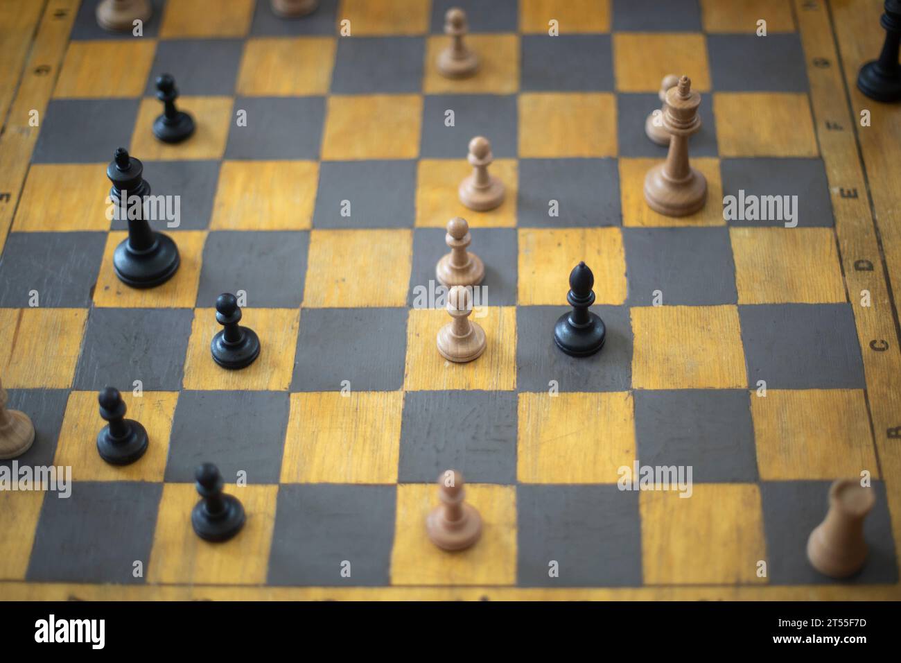 Playing chess in tournament. Chess pieces on board. Stock Photo
