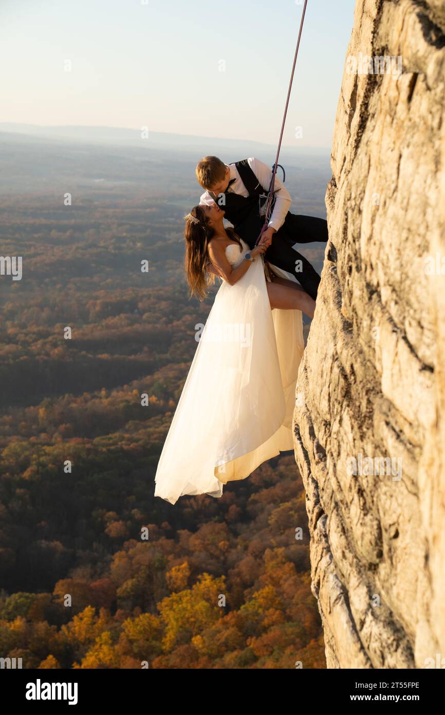 Rock Climbing Wedding Bride and Groom at Sunrise Stock Photo Alamy