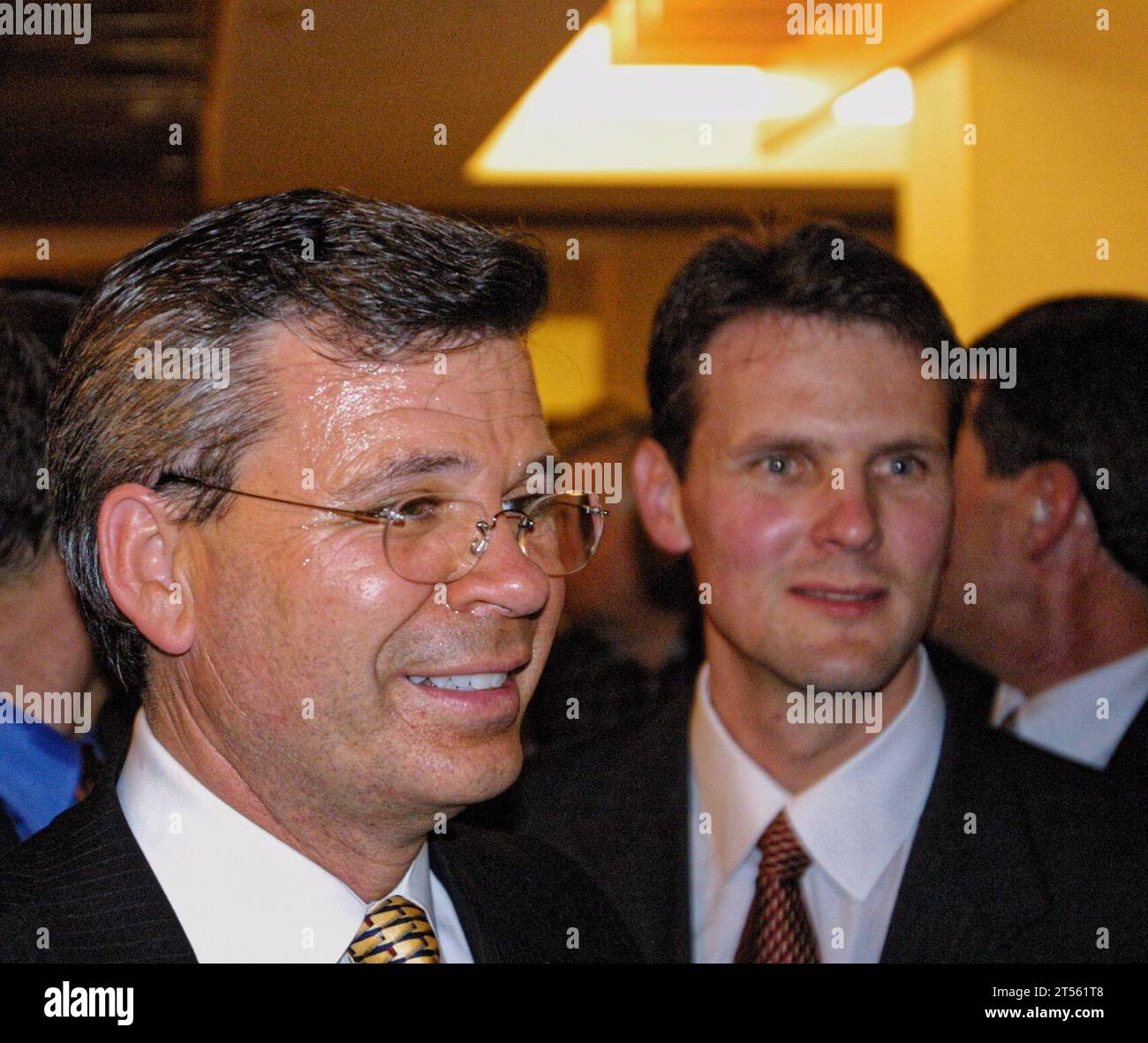 Gov.-elect Ernie Fletcher (left) greets supporters at his election night victory party on Tuesday, Nov. 4, 2003 at the Marriott Griffin Gate Resort in Lexington, Fayette County, KY, USA. A physician and three-term congressman representing Kentucky's 6th congressional district, Fletcher defeated Democrat Ben Chandler to become Kentucky's first Republican governor since 1967. (Apex MediaWire Photo by Billy Suratt) Stock Photo