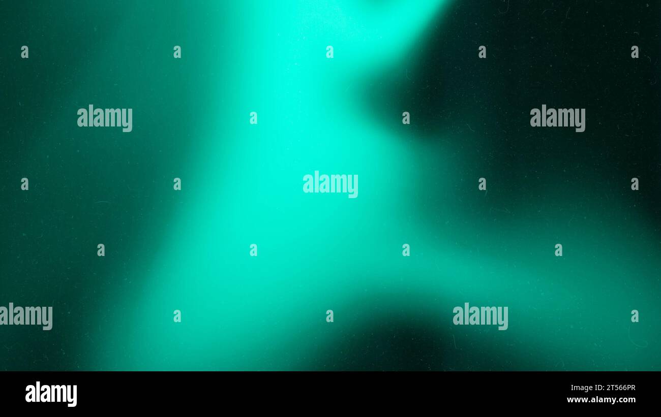Green emerald color abstract gradient grainy background. Illuminated