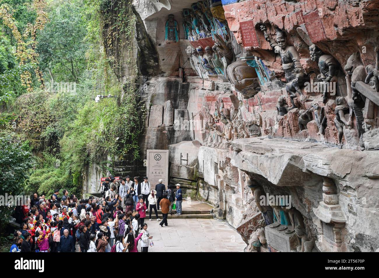 (231103) -- CHONGQING, Nov. 3, 2023 (Xinhua) -- People visit the scenic spot of Dazu Rock Carvings in Chongqing, southwest China, Nov. 1, 2023. The scenic spot of Dazu Rock Carvings saw about one million tourist trips made from January to October this year, up 358.7 percent year on year.    The Dazu Rock Carvings were placed on the World Heritage List by the United Nations Educational, Scientific and Cultural Organization (UNESCO) in 1999. (Xinhua/Wang Quanchao) Stock Photo