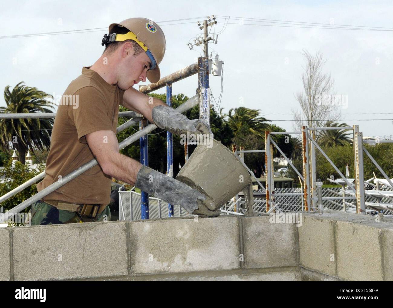 NMCB7, pours core fill to reinforce constructed masonry unit blocks