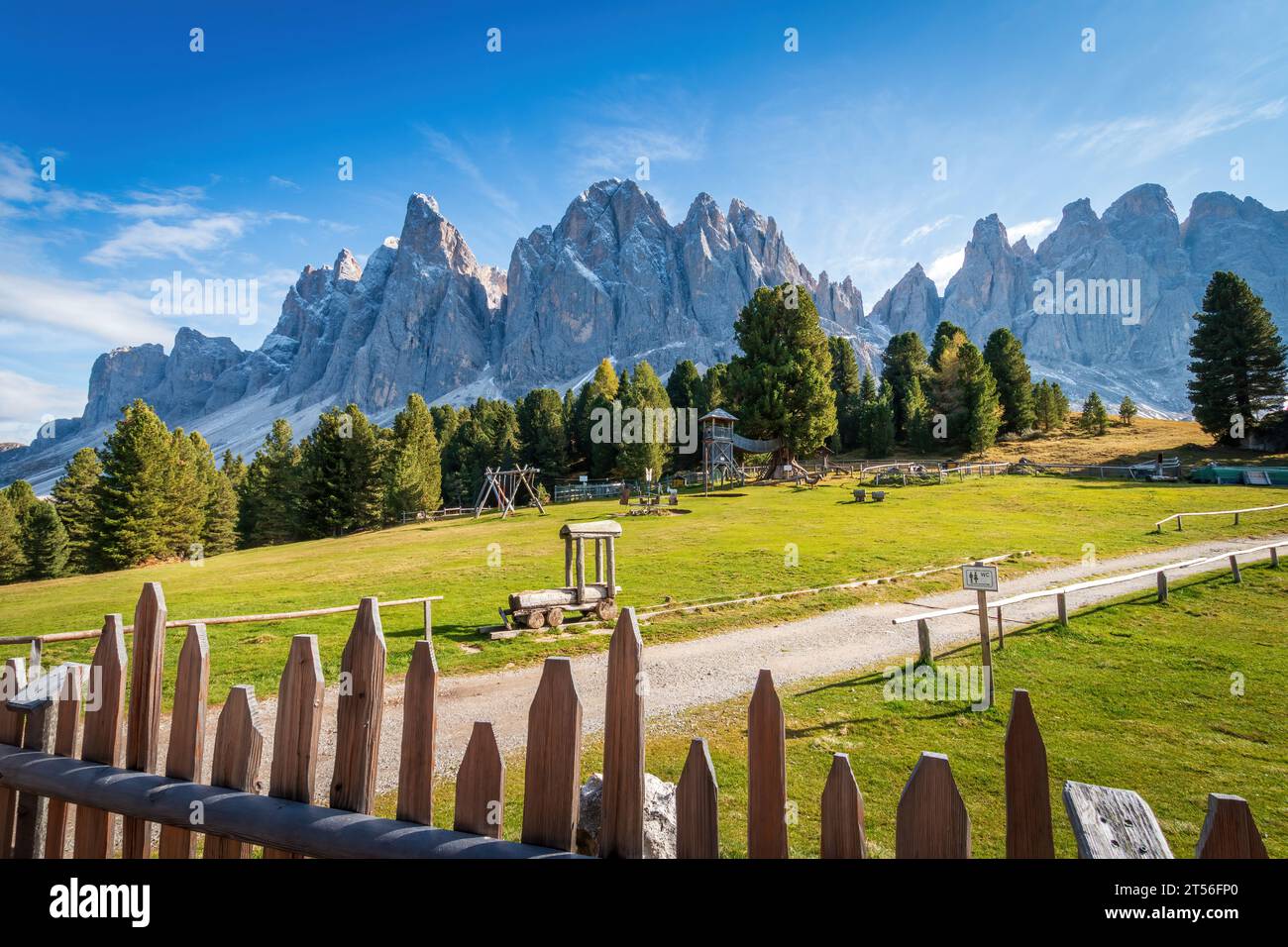Scenic view of La Furchetta and Sass Rigais mountains (left) and the mountain massif Geisler Odle (right), Dolomites, South Tyrol, Italy against blue Stock Photo