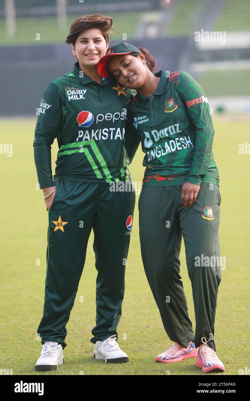 Captains of Bangladesh and Pakistan women cricket team Nigar Sultana Joty (R) and Nida Dar (L) possess for photographs after unveil the One Day Intern Stock Photo