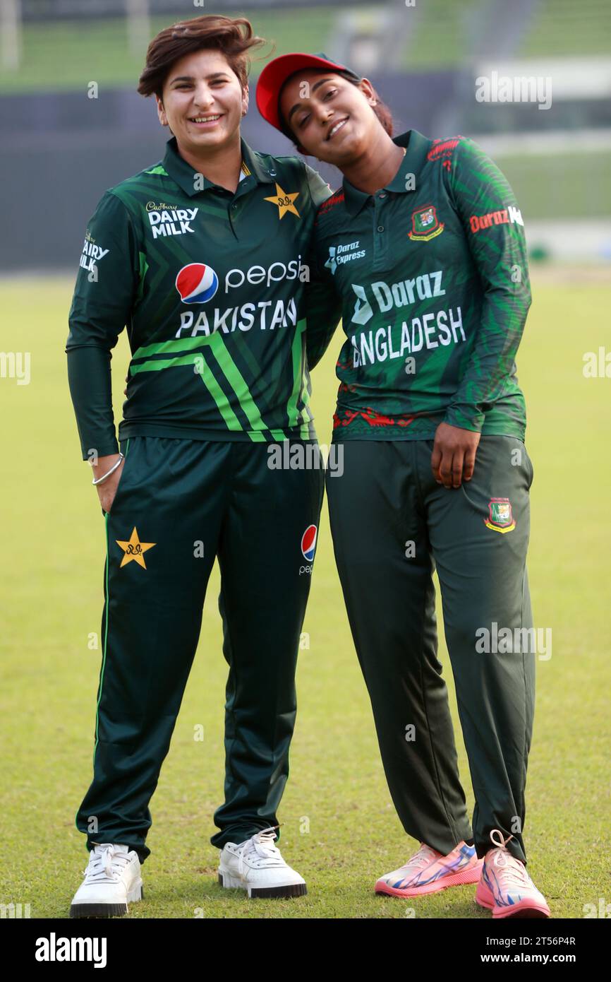 Captains of Bangladesh and Pakistan women cricket team Nigar Sultana Joty (R) and Nida Dar (L) possess for photographs after unveil the One Day Intern Stock Photo