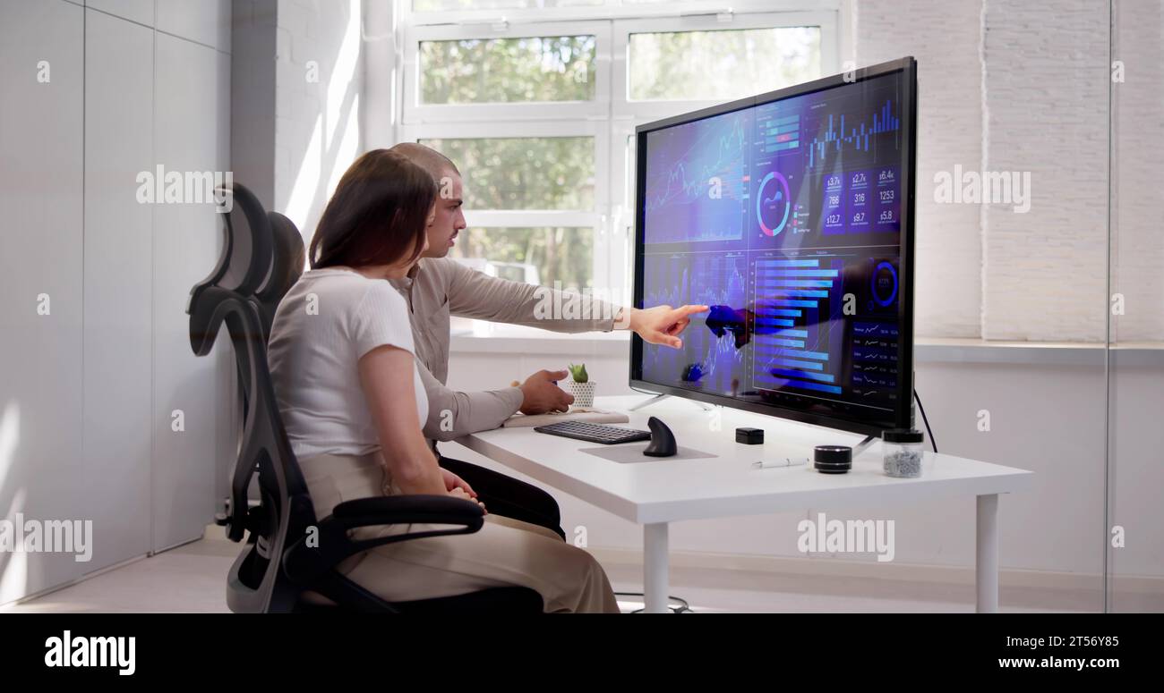 Data Analyst Using Data Analytics KPI Dashboard Stock Photo