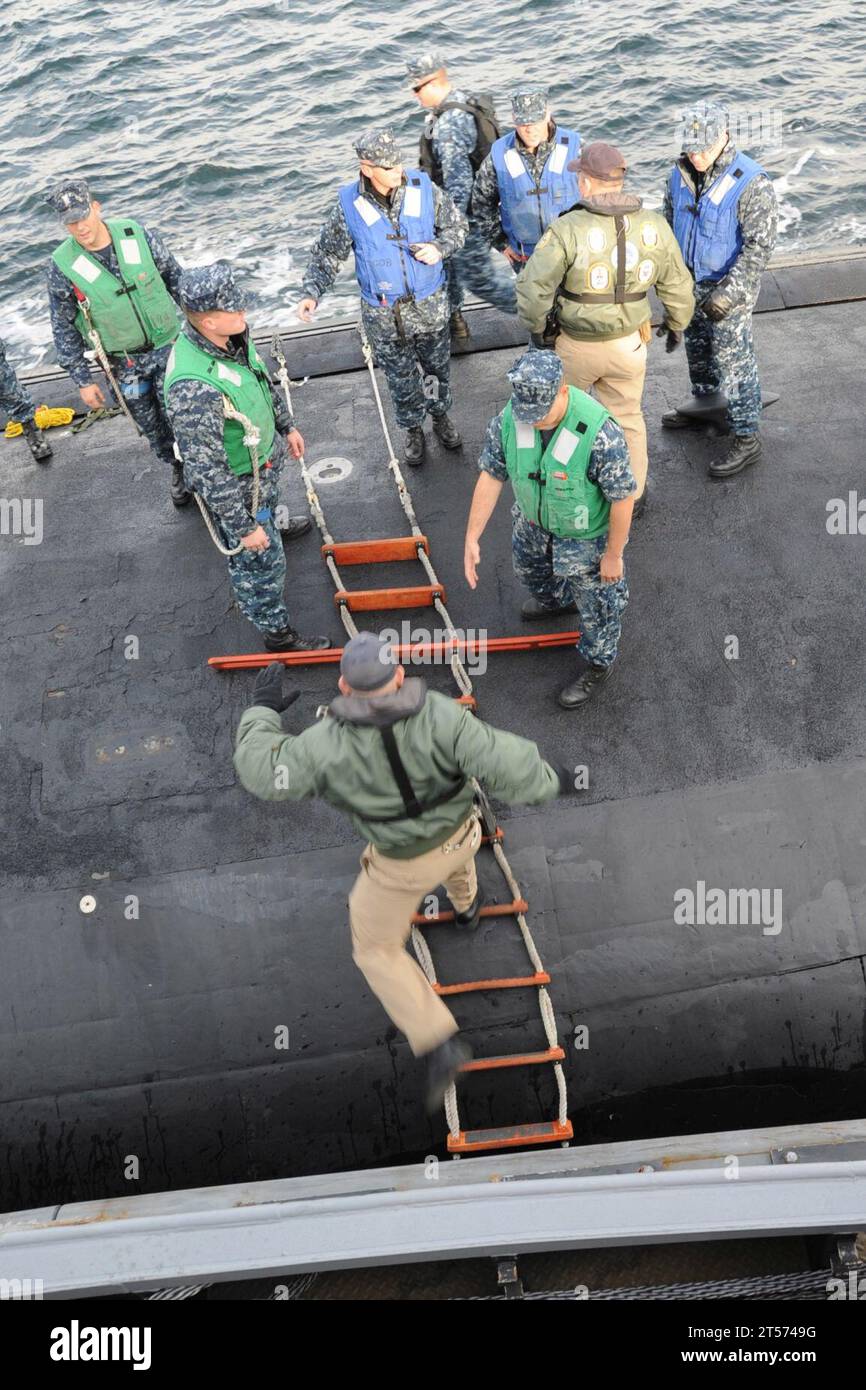 US Navy harbor pilot boards USS North Carolina.jpg Stock Photo Alamy