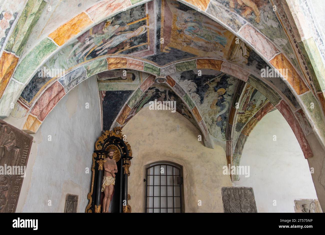 Novacella Augustinian Abbey. The Gothic cloister with from valuable frescoes, Brixen (Bressanone), South Tyrol, Trentino Alto Adige, northern Italy. Stock Photo