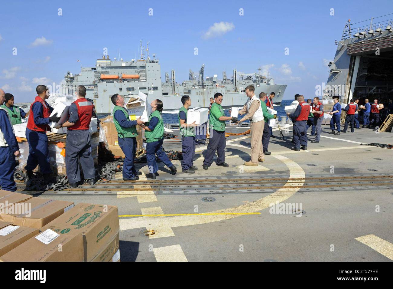 US Navy Sailors aboard the Arleigh Burke-class guided-missile destroyer ...