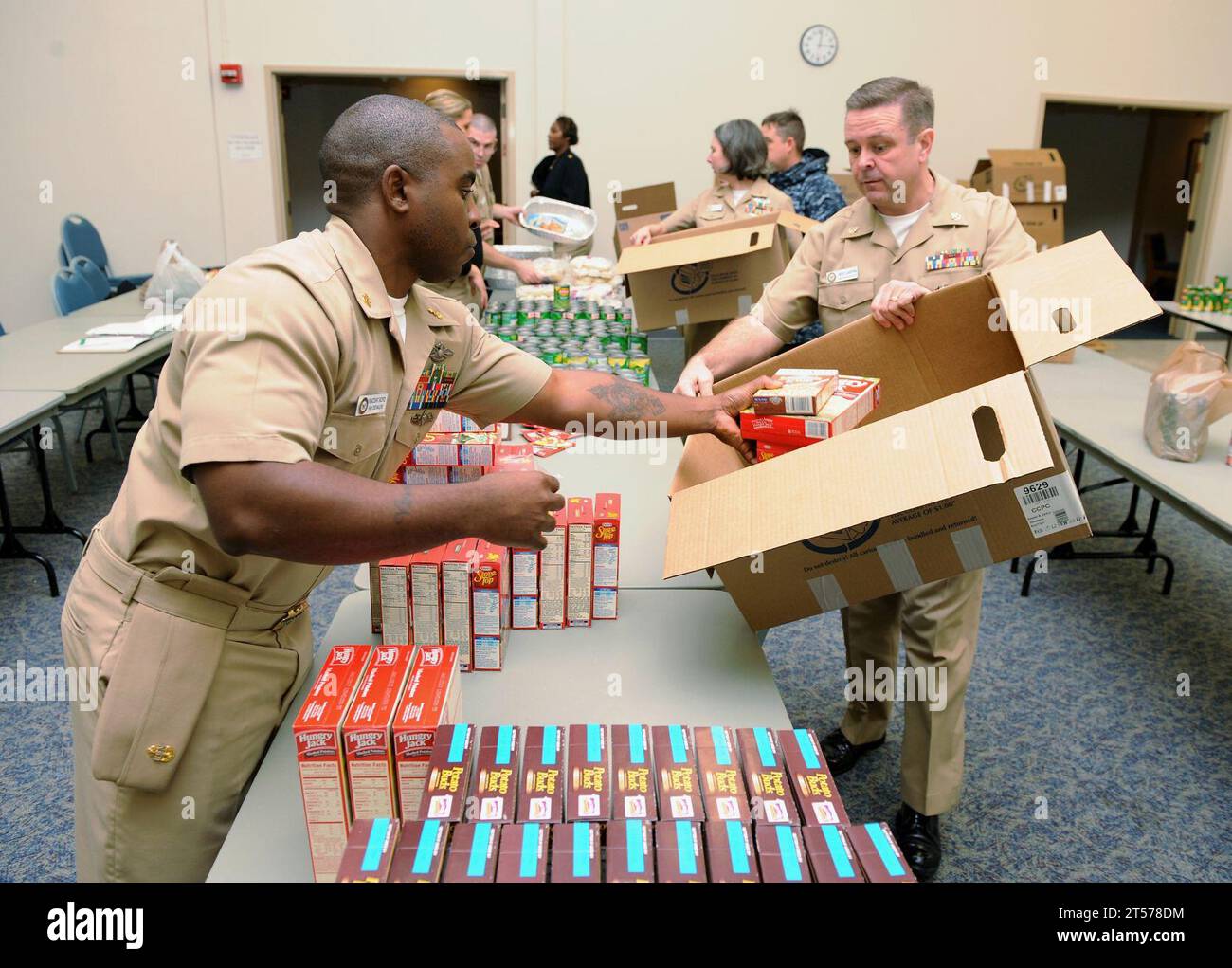 Us Navy Sailors Assigned To Naval Support Activity Mid-south Pack Boxes 