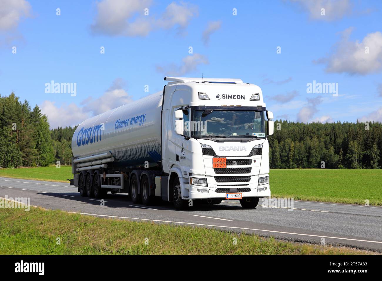White Scania 500R truck tank semi-trailer Gasum hauls LNG, Liquified natural gas, ADR 223-1972, on highway. Jokioinen, Finland. July 21, 2023. Stock Photo