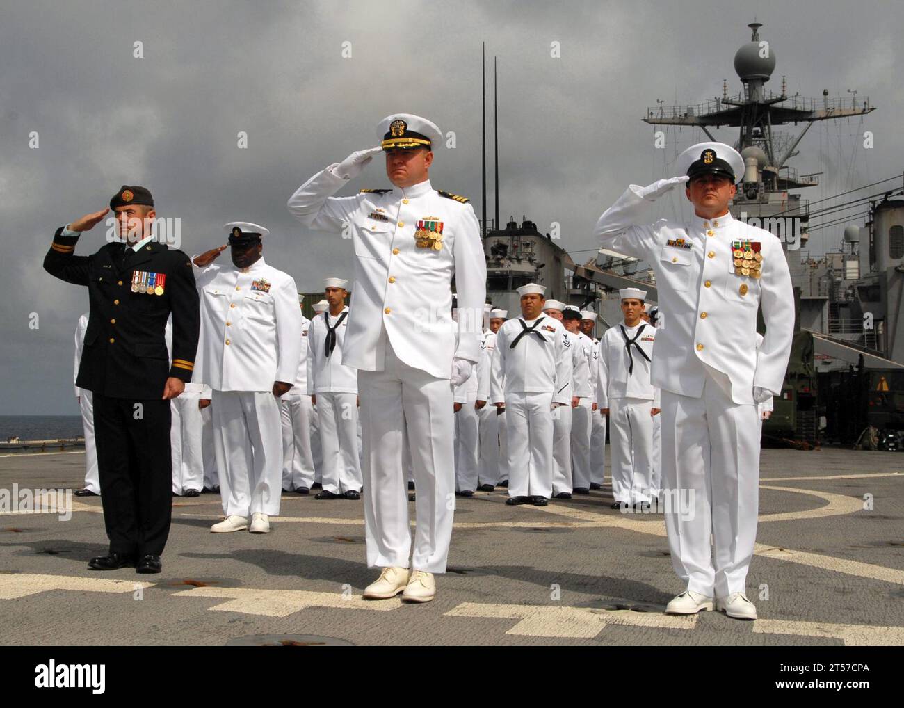 US Navy The official party render salutes in honor of a deceased Navy ...