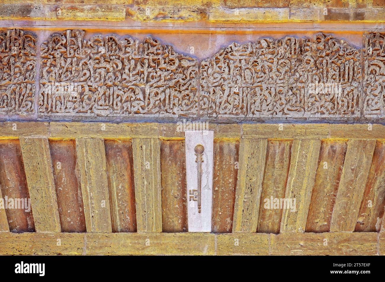 Granada, Spain, a key symbol on top of an ancient door. Islamic or