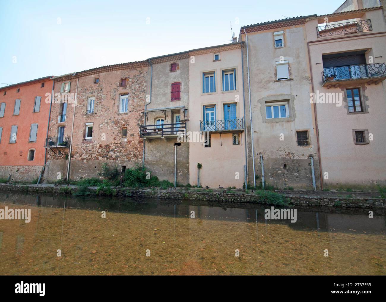 Houses by the river in Saint-Chinian, France Stock Photo