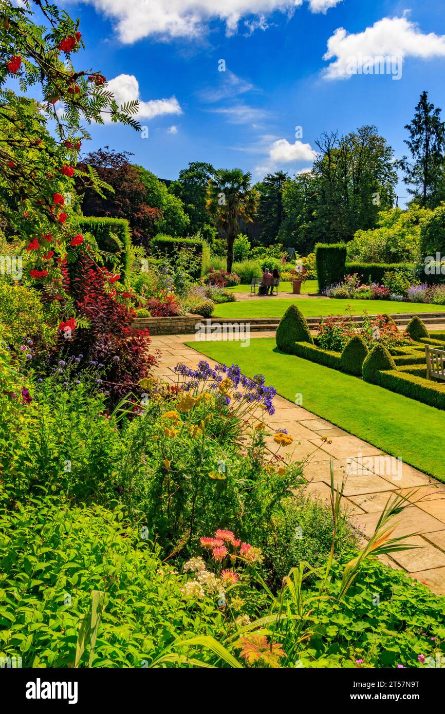 The colourful borders and topiary hedges in the parterre at Kilver