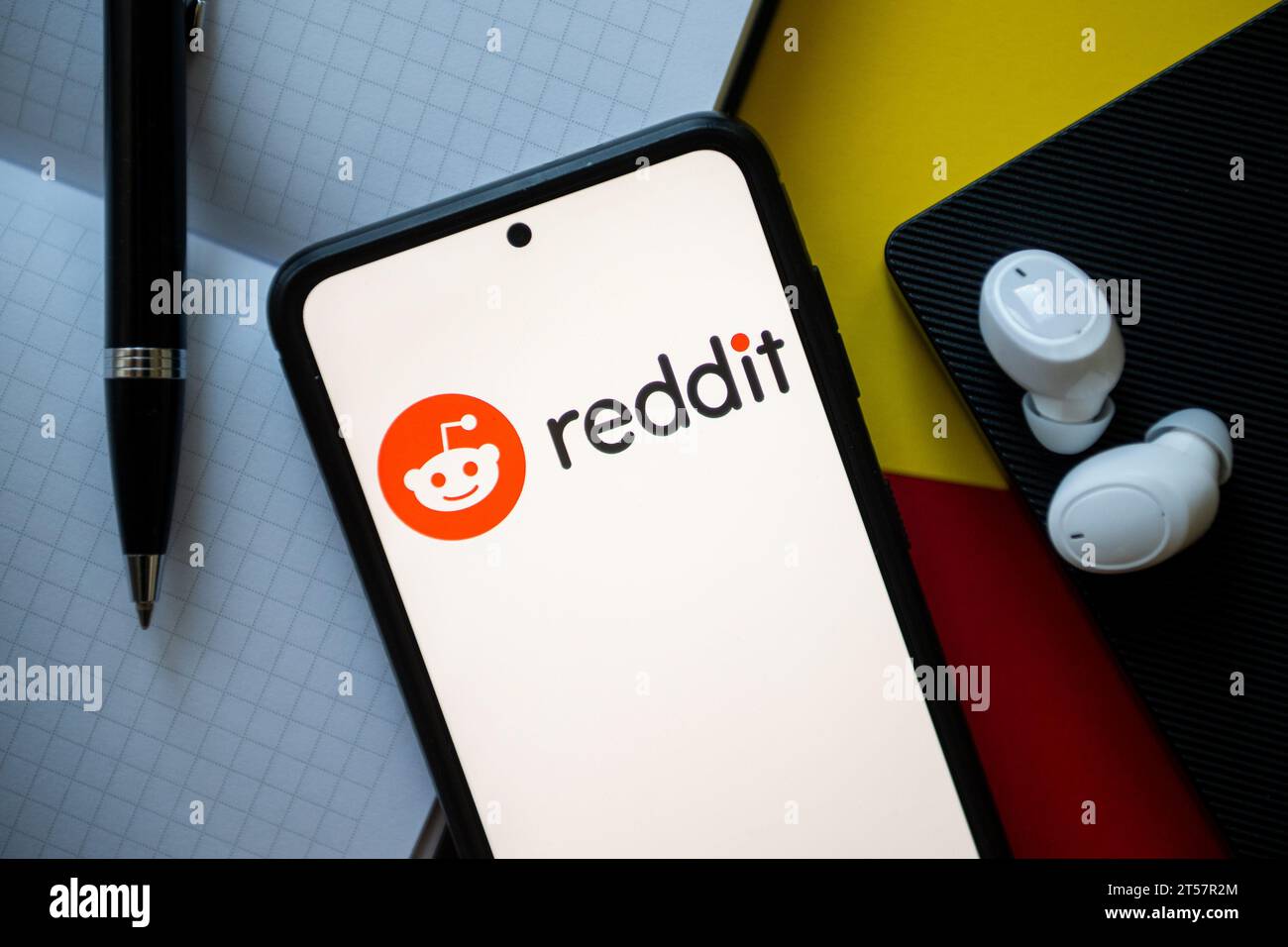 In this photo illustration a Reddit logo seen displayed on a smartphone ...