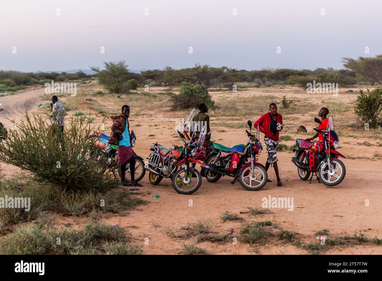 SOUTH HORR, KENYA - FEBRUARY 11, 2020: Moto Taxi drivers waiting in a desert near South Horr in northern Kenya Stock Photo