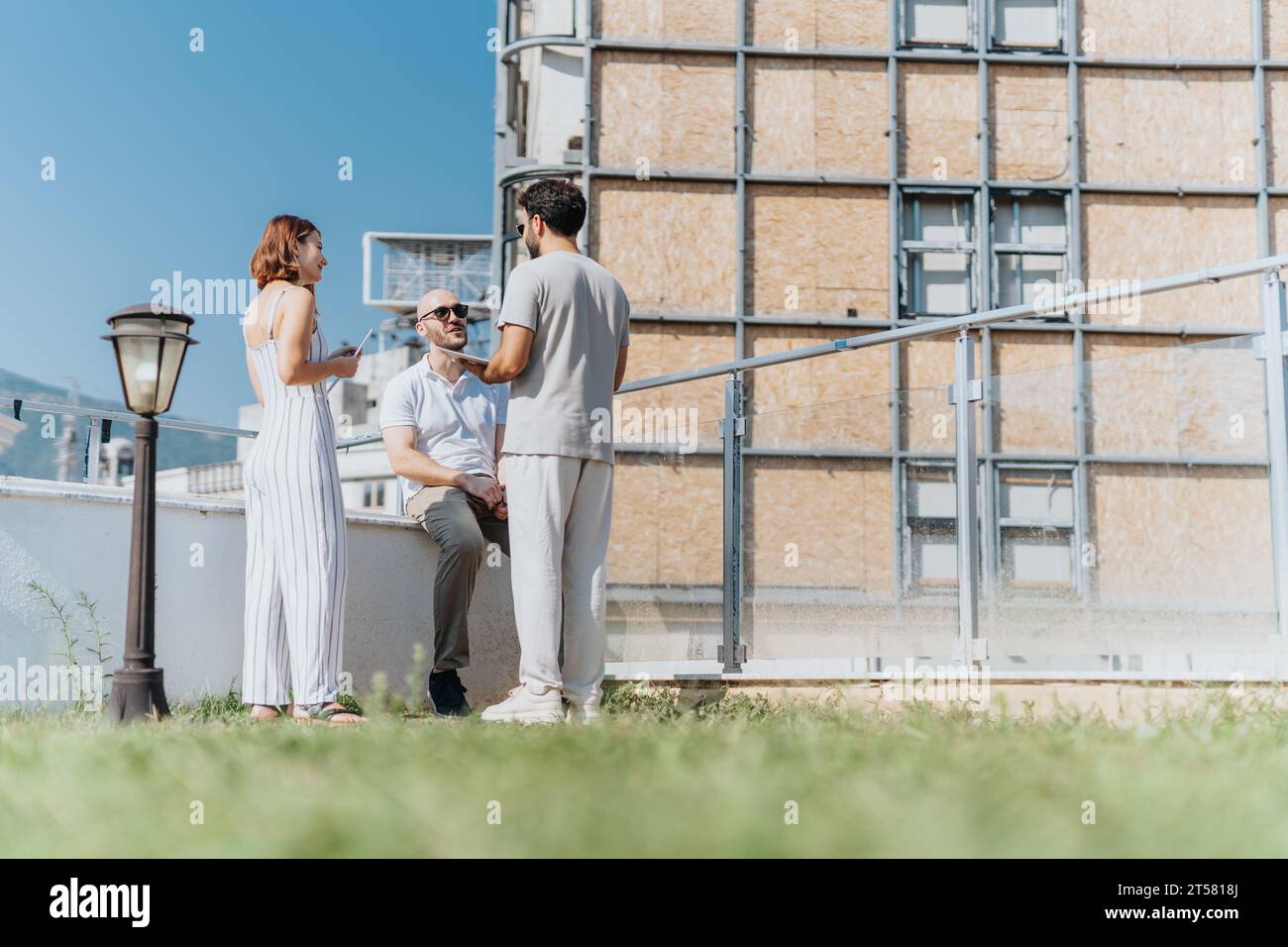 Successful Urban Project: Architects Collaborating on Building Construction Stock Photo