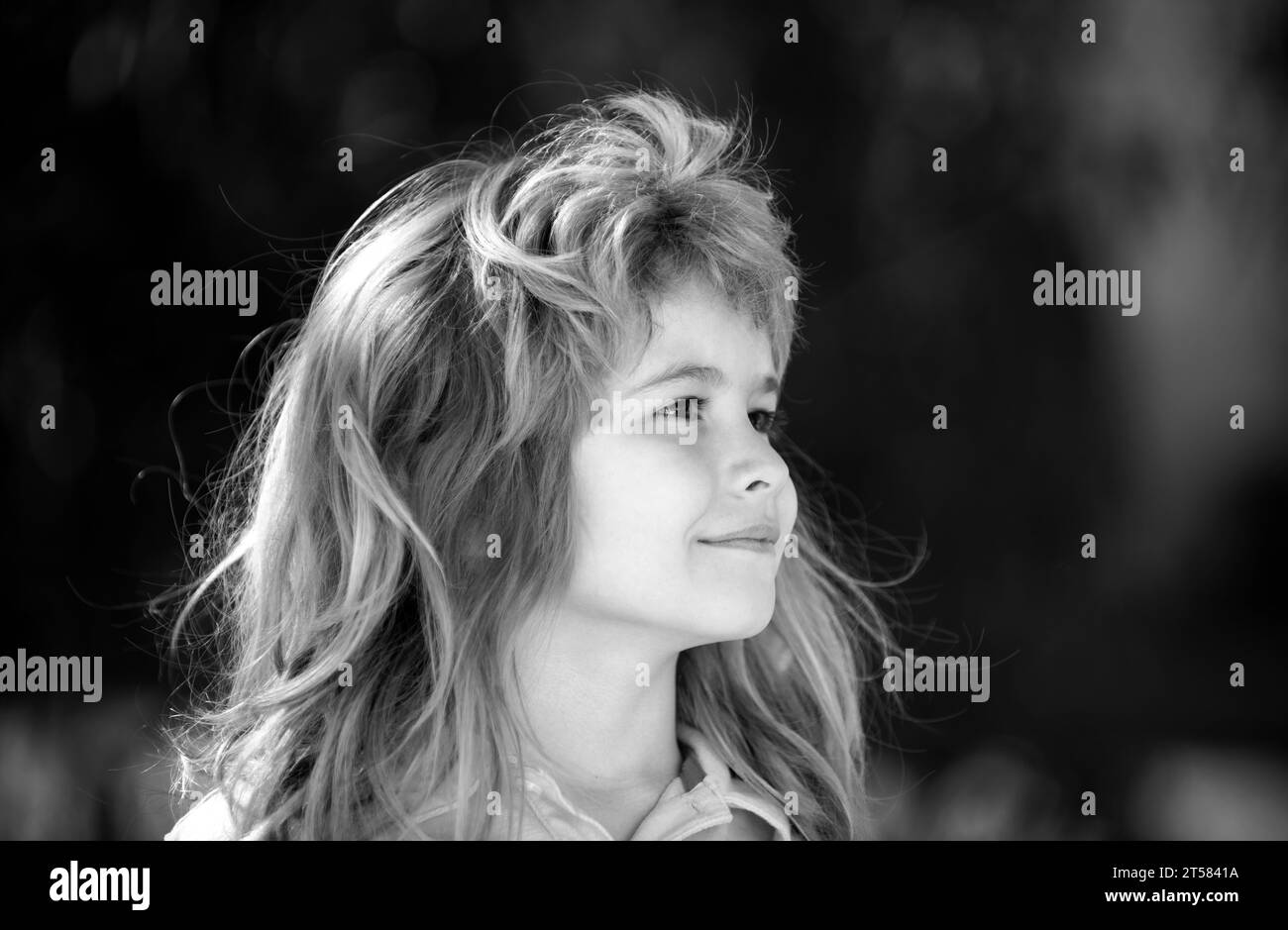 Profile kids face. Portrait of adorable little boy on green background