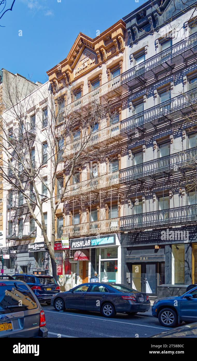 249 and 251 East 77th Street are mirror twin fivestory brownstone